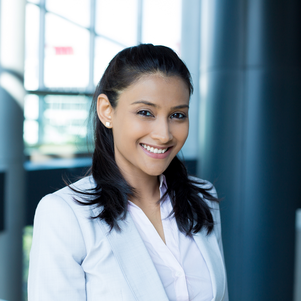 Grad Website Landing Page 3 FranklinCovey-Graduate-Learning-Journey-Female-Graduate-at-the-Office