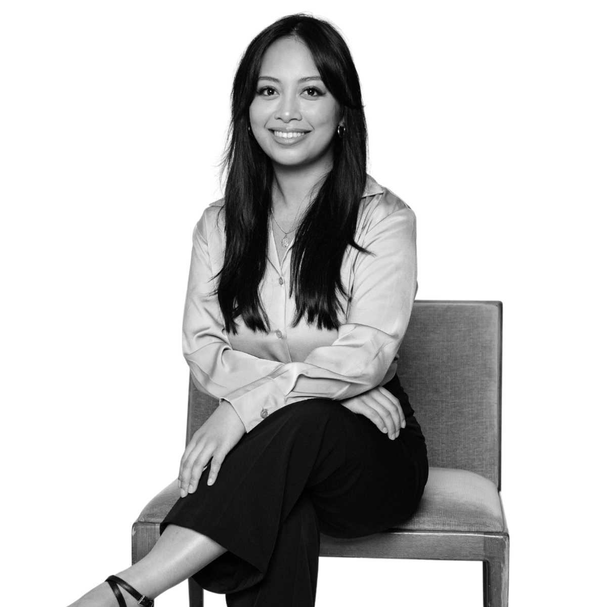 FranklinCovey-Graduate-Learning-Journey-Female-Graduate-Sitting-On-Chair